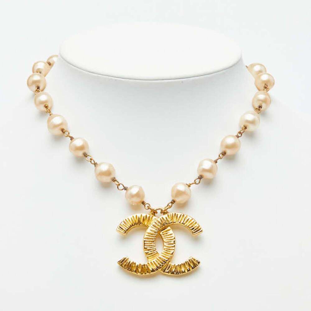 CHANEL Gold Pearl Logo Necklace - Picture 7 of 7